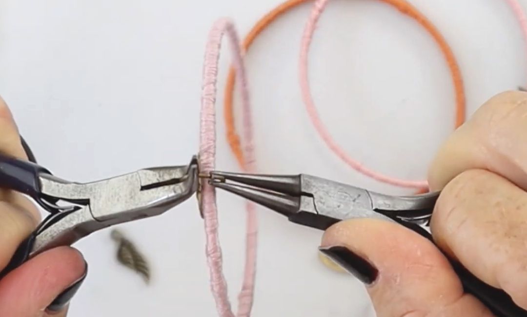 This is a DIY Bracelet tutorial to make bracelets using embroidery thread. In this step we re adding charms.